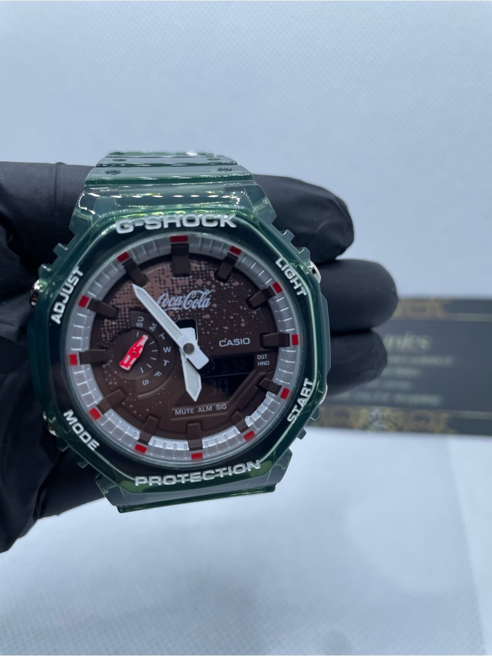 Casio G-Shock Green Resin Watch with Brown Dial and Red Accents
